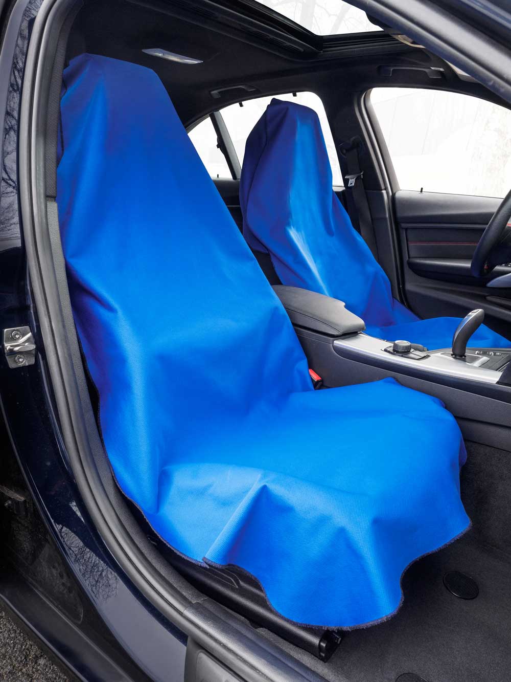 2 xl truck waterproof seat covers in a vehicle #color_black #color_light_gray #color_royal_blue #color_tan #color_red #color_purple #color_fuchsia