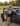 Man after a run is about to get into his car with a DriSeat waterproof seat cover protecting his drivers seat